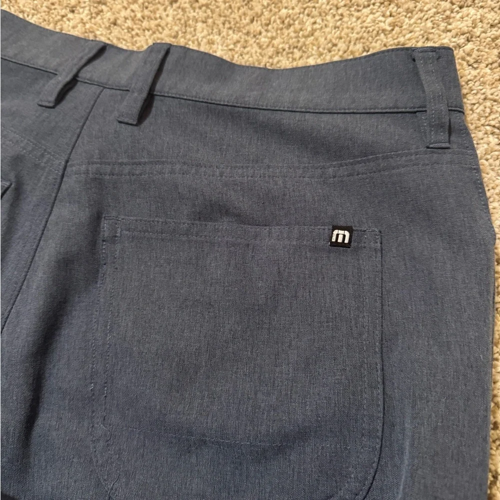 Travis Mathew description flat